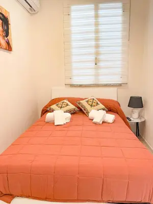 Letto o letti in una camera di Siciliabedda Ortigia Holiday house