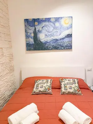 Letto o letti in una camera di Siciliabedda Ortigia Holiday house