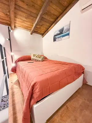 Letto o letti in una camera di Siciliabedda Ortigia Holiday house
