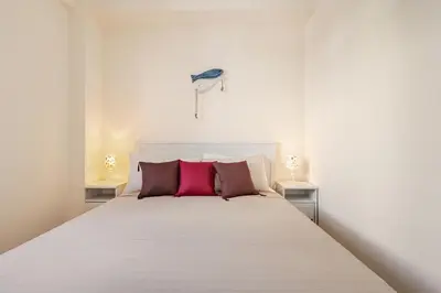 Letto o letti in una camera di Il Ficodindia Guest House WI-Fi a due passi dal centro