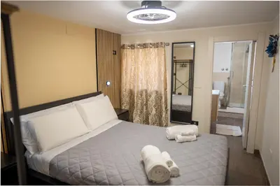 Letto o letti in una camera di Meravigghia Syracusae Home