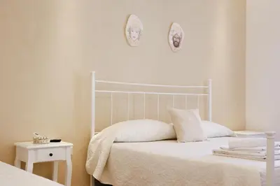 Letto o letti in una camera di Casa Dava