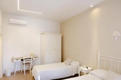 Letto o letti in una camera di Casa Dava