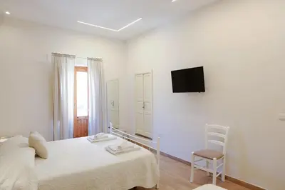 Letto o letti in una camera di Casa Dava