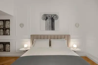 Letto o letti in una camera di Palazzo Palmeri Rooms