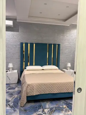 Letto o letti in una camera di Naomi Luxury Home 2
