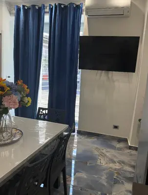 TV o dispositivi per l'intrattenimento presso Naomi Luxury Home 2