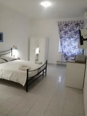 Letto o letti in una camera di Casa MALFITANO Aurora
