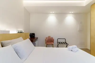 Letto o letti in una camera di Mènnula