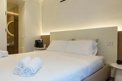 Letto o letti in una camera di Mènnula