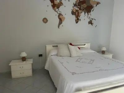 Letto o letti in una camera di Casa Nicuzza