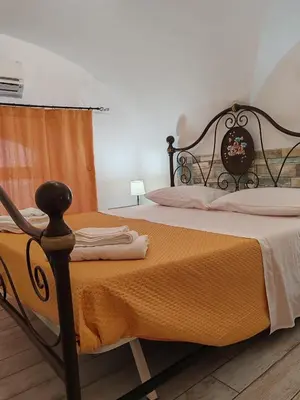 Letto o letti in una camera di Vaccarini Home