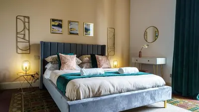 Letto o letti in una camera di Sicilia Experience - Palazzo Nouveau