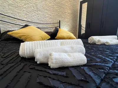 Letto o letti in una camera di Periperihomesiracusa