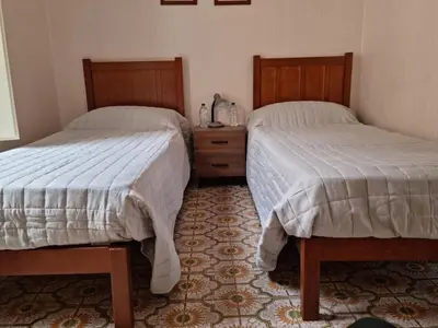 Letto o letti in una camera di La casa della zia Concetta