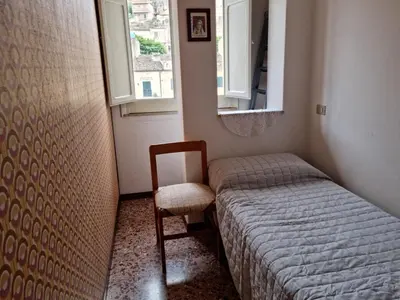 Letto o letti in una camera di La casa della zia Concetta