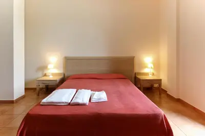Letto o letti in una camera di Poseidon