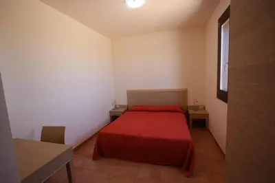 Letto o letti in una camera di Poseidon