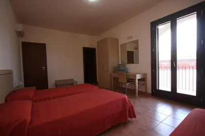Letto o letti in una camera di Poseidon