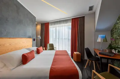 Letto o letti in una camera di Wellness Spa Hotel Principe Fitalia