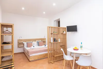 Letto o letti in una camera di Domus 116 Ortigia by Ortigiaapartments