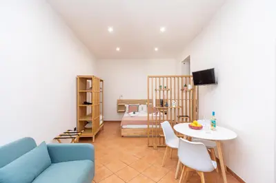 TV o dispositivi per l'intrattenimento presso Domus 116 Ortigia by Ortigiaapartments