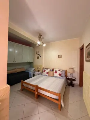 Letto o letti in una camera di Villa Militello - Nel Cuore del Barocco UNESCO