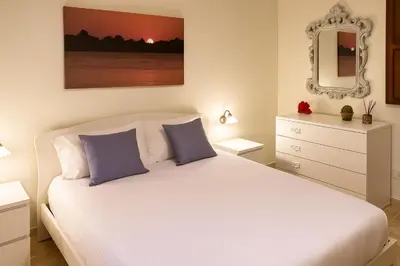 Letto o letti in una camera di Appartamento in Siracusa Centro- Dimora Eucleide