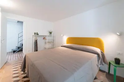 Letto o letti in una camera di Dimora Netina by Wonderful Italy
