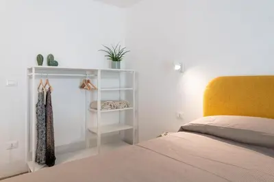 Letto o letti in una camera di Dimora Netina by Wonderful Italy