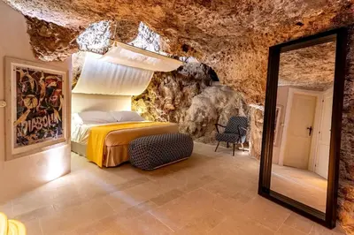 Letto o letti in una camera di Charming Nest with Terrace by Wonderful Italy