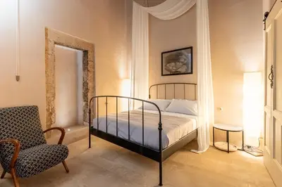 Letto o letti in una camera di Charming Nest with Terrace by Wonderful Italy