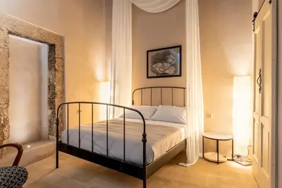 Letto o letti in una camera di Charming Nest with Terrace by Wonderful Italy