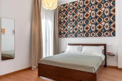 Letto o letti in una camera di Ierone Apartment with Balcony by Wonderful Italy
