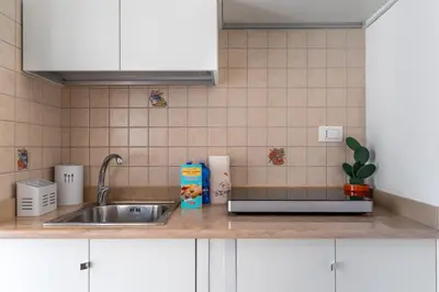 Cucina o angolo cottura di Ierone Apartment with Balcony by Wonderful Italy