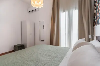 Letto o letti in una camera di Ierone Apartment with Balcony by Wonderful Italy