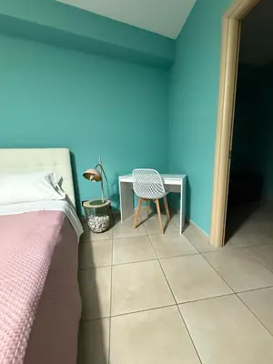 Letto o letti in una camera di Zefia home G