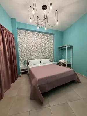Letto o letti in una camera di Zefia home G