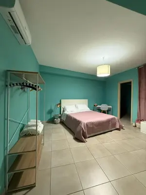 Letto o letti in una camera di Zefia home G