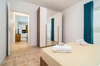 Letto o letti in una camera di Sea Residence LUNA ROSSA