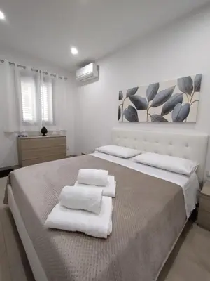 Letto o letti in una camera di Manenti Holiday House