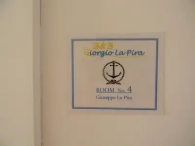 Certificato, attestato, insegna o altro documento esposto da B&B Giorgio La Pira
