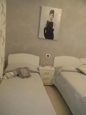 Letto o letti in una camera di B&B Giorgio La Pira