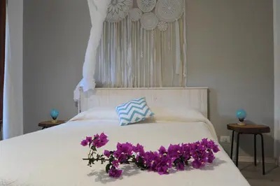 Letto o letti in una camera di Villa Sciammaca