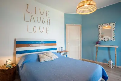 Letto o letti in una camera di Villa Sciammaca