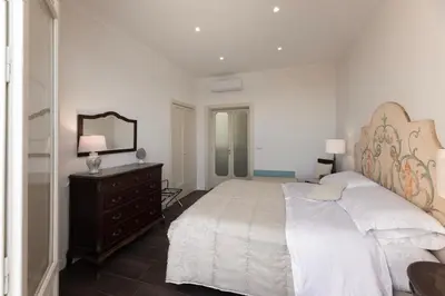 Letto o letti in una camera di Unicum Ortigia