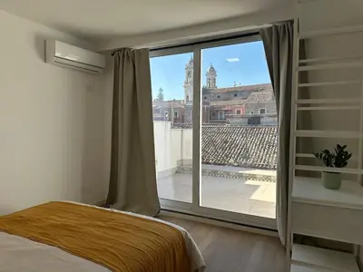 Letto o letti in una camera di Duomo Terrace
