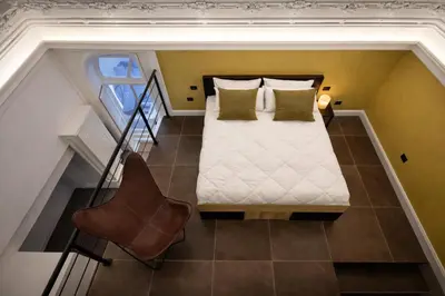Letto o letti in una camera di Cucunci Suite