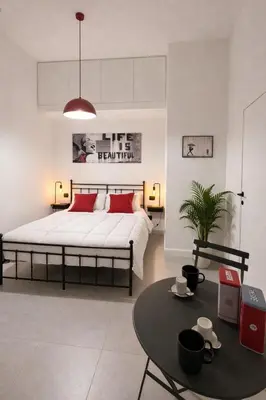 Letto o letti in una camera di Cucunci Suite