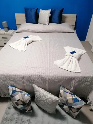 Letto o letti in una camera di Villa Porto fossa